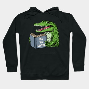 An alligator reading a book titled See ya later Hoodie